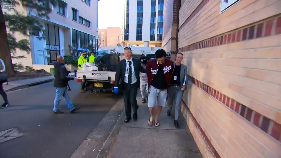 A man (centre) has been charged with allege ... t a home in Sydney's inner west. (9News)