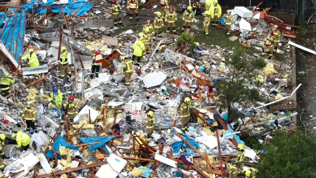 An acoustic monitoring device, jackhammers, chainsaws and other equipment are being used to break up the rubble. (Fire and Rescue NSW)