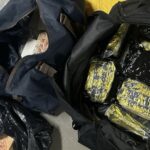 12.During the searches, police located and seized 415kg of prohibited drugs. (Nine)
