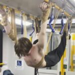 19.One of the alleged stunts included Joshua Cherub duct taping himself to the overhead railings of a Sydney train. Picture Instagram_news.com.au