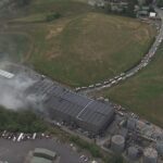 6.A massive fire has engulfed a rubbish tip in Sydney’s southwest, ﻿causing black plumes of smoke to billow over the area. (Nine)