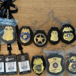9.Inside his Sydney Harbour-side apartment officers allegedly uncovered a trove of fake law enforcement badges, including the CIA, FBI and US Secret Service. (Australian Federal Police)