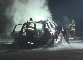 Guildford, 표적 총격 사건 Police are investigating if this Porsche Cayenne was the getaway car. (9News)