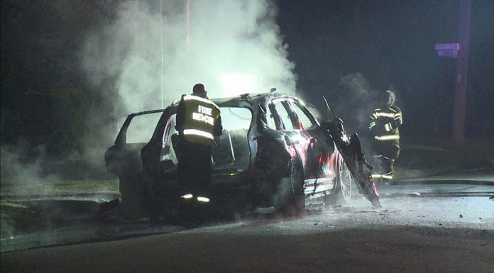 Guildford, 표적 총격 사건 Police are investigating if this Porsche Cayenne was the getaway car. (9News)