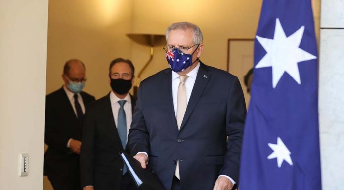 백신 안 맞으면 해외여행 난관 Prime Minister Scott Morrison on Friday.CREDITALEX ELLINGHAUSEN
