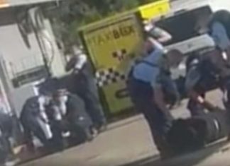 길포드 주유소에서 마스크를 두고 경찰과 대치한 다섯 명 체포 The altercation occurred at a Guildford service station on Friday afternoon. Credit Supplied