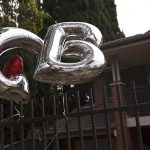 Balloons are tied to the front gate of Gladys Berejiklian’s Sydney home today after her shock resignation. (Getty)