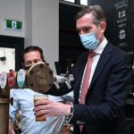 NSW Premier Dominic Perrottet (right) with NSW Deputy Premier Paul Toole (left) pouring a beer at Watson’s pub in Moore Park.CREDITKATE GERAGHTY
