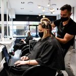 Hairdresser Tony Boutsalis from Salt Hair in Coogee with customer Helen Appleton. CREDIT:EDWINA PICKLES