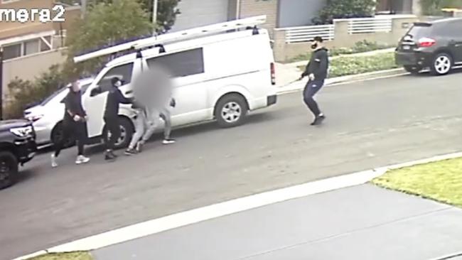 The victim was forced into the rear of a white Toyota Hiace. Credit NSW Police