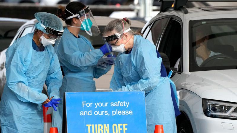 New South Wales endured another dark day on the pandemic, with 21 people dead in the last 24 hours. (AP Mark Baker)