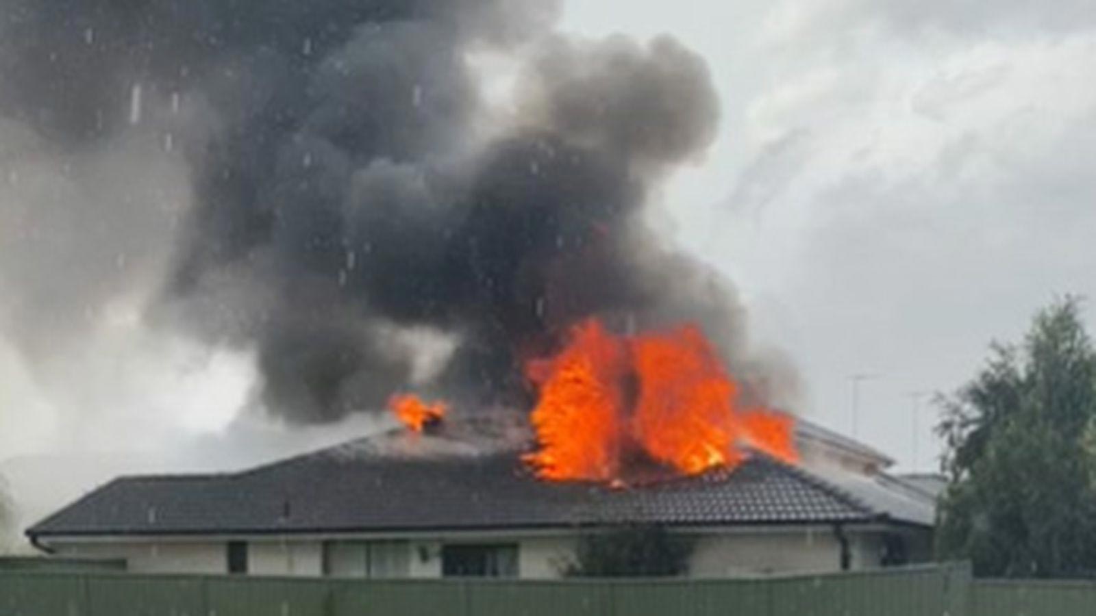 A house has been destroyed after a suspected lightning strike in Sydney. (Nine)