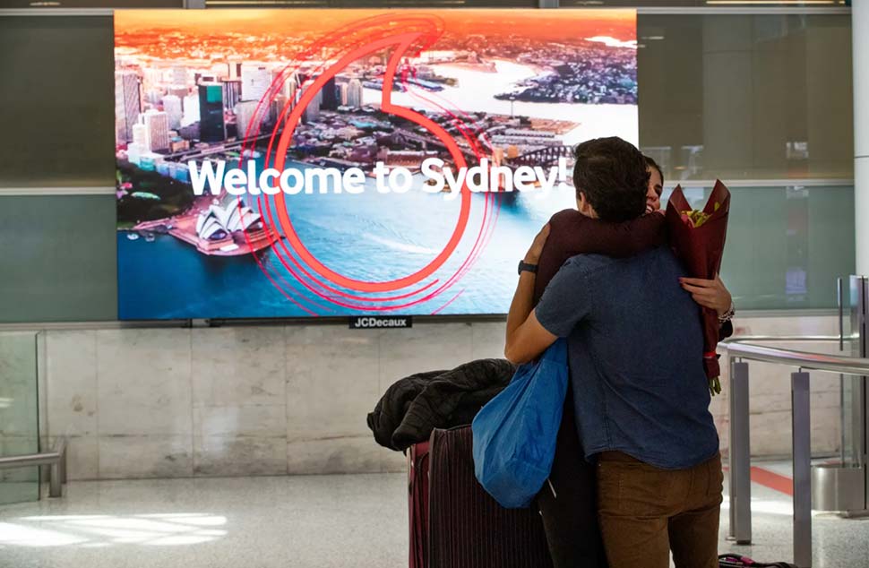 Scenes from Sydney Airport on Sunday as Australia gears up to welcome overseas visitors for the first time in two years on Monday.CREDITEDWINA PICKLES