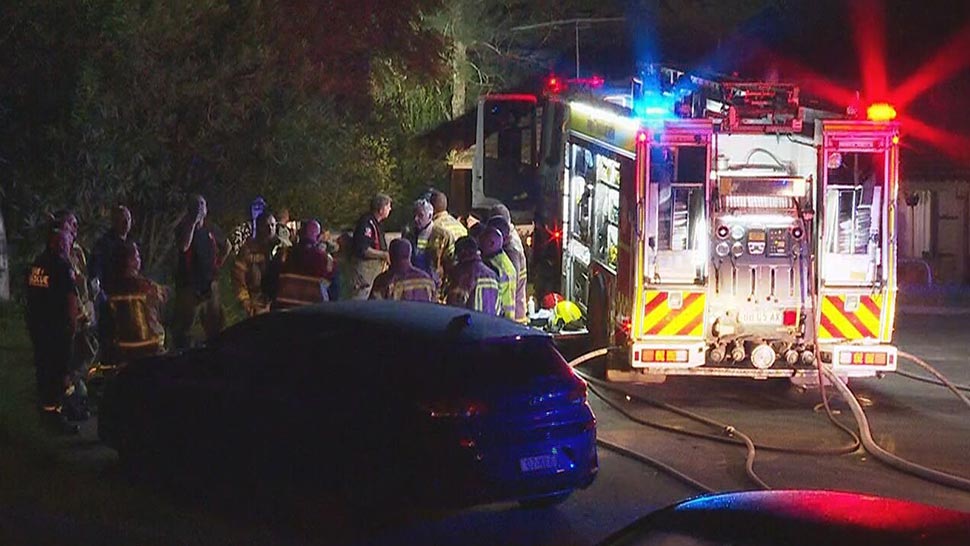 Windows cracked in the heat of the blaze causing loud noises to ring out across the street. (9News)