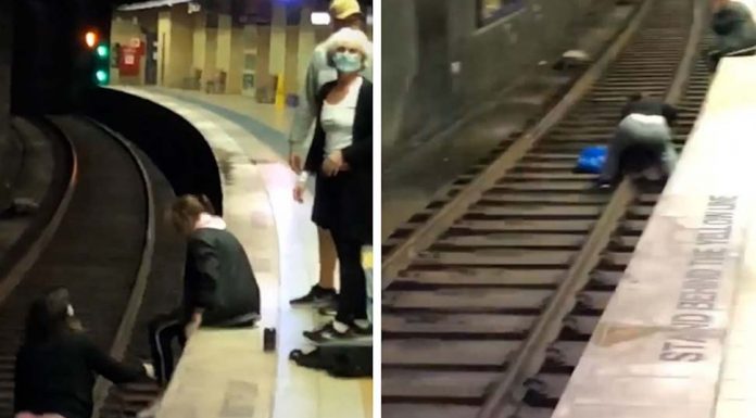 레드펀 기차 선로에 추락해 죽을 뻔한 남성 병원에서 체포 Two commuters jumped onto the track after a man fell. (9News)