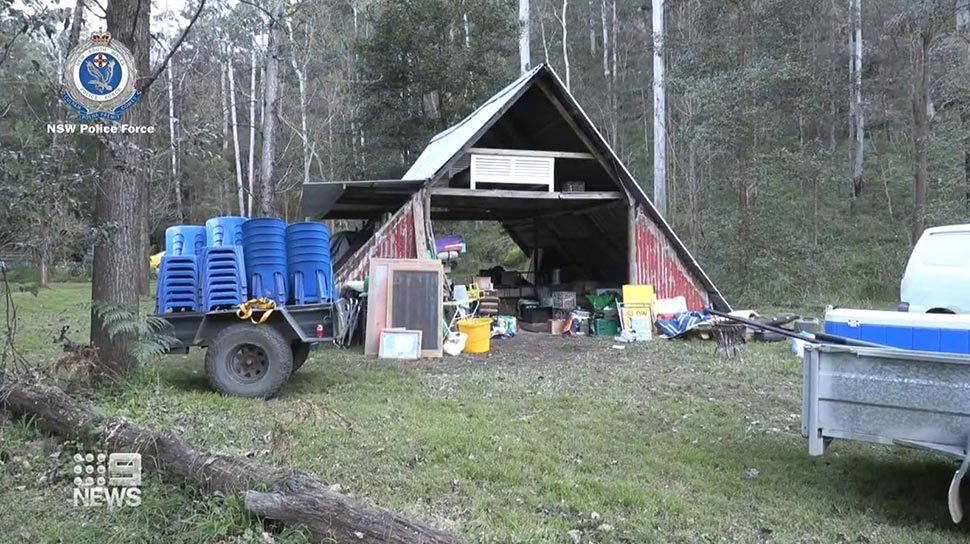 The property in Colo, said to be run by members of Blockade Australia, was being watched by camouflage police yesterday when the cops were spotted (Supplied)