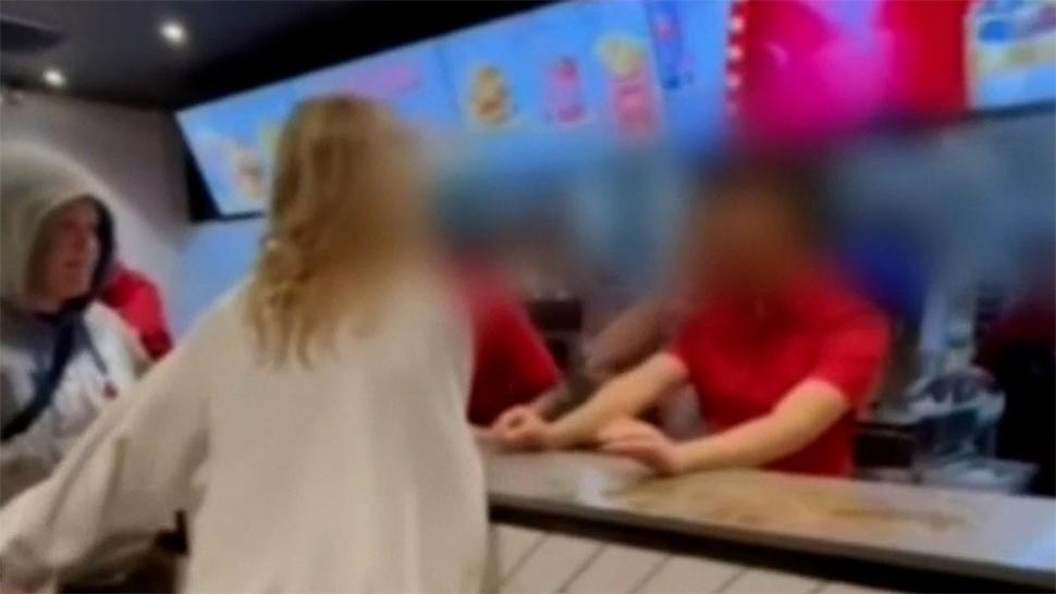 Shocking footage has emerged of a young woman lashing out and spitting at McDonalds staff in Adelaide.Police are now investigating the incident, which the Retail Workers' Union has labelled vile and disgusting. (Nine)