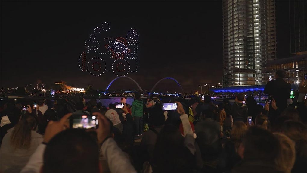 As drones drew colourful festive scenes in the sky, some started dropping to the earth. (Nine)