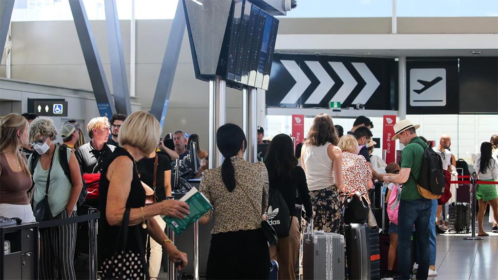 Passengers are seen queuing in long lines to check in at the Domestic Airport in Sydney on Wednesday, during what airport officials are calling the facility’s busiest season since 2019. Picture NCA Newswire Gaye Gerard