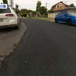 A Melbourne council has apologised to residents after a street was resurfaced around parked cars this week. (Nine)