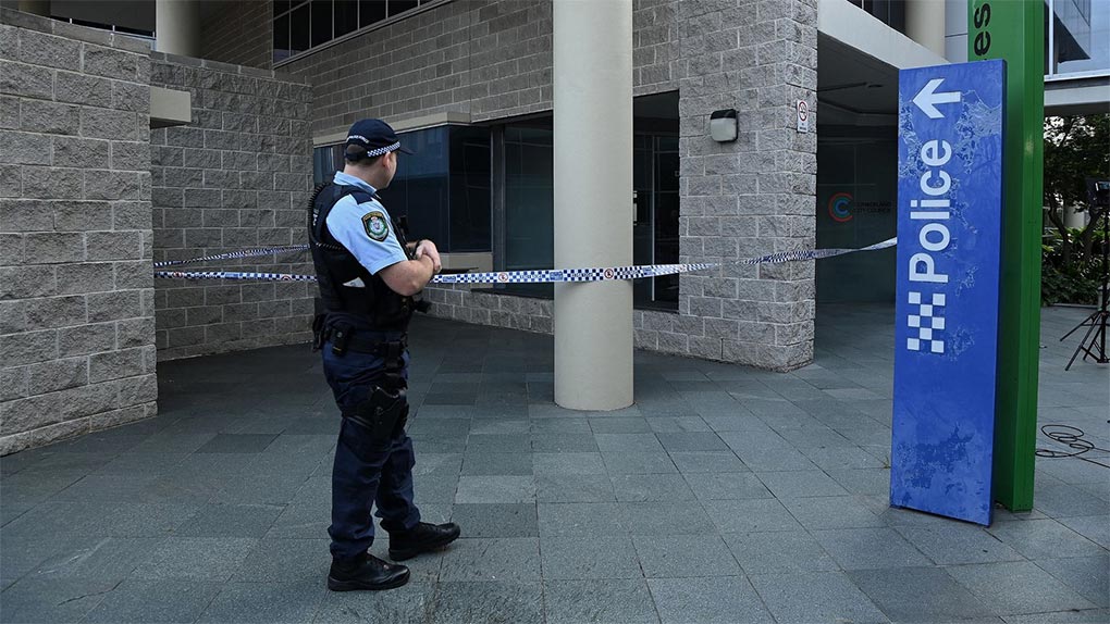 Auburn police station has been taped off while forensic teams analyse the scene. (Kate Geraghty)