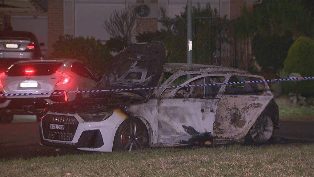 Two burnt-out car were found close to the crime scene in Western Sydney after a man was shot dead. (Nine)