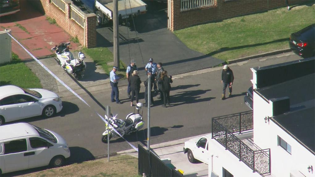 Police at the scene of a shooting at Greenacre in Sydney. (9News)