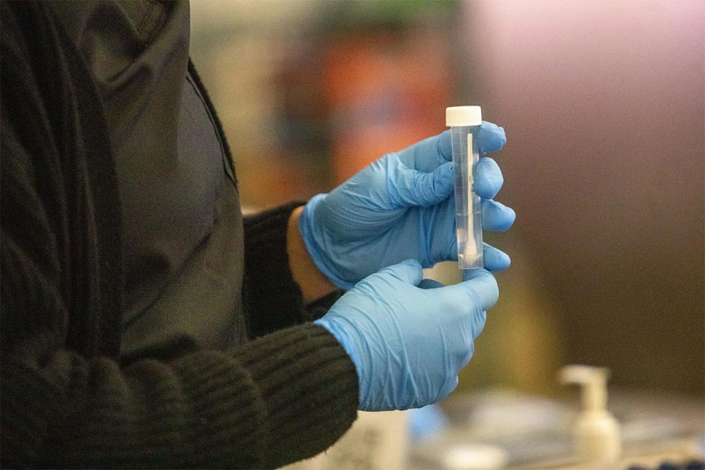 A test swab at a COVID-10 Variant testing site inside the airport in Los Angles. - BLOOMBERG