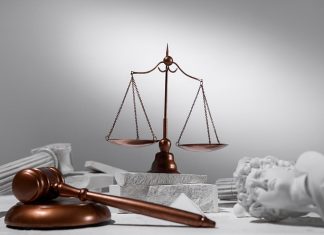 NSW 교사, 폭행 유죄 판결을 뒤집다 still-life-with-scales-justice-image by freepik