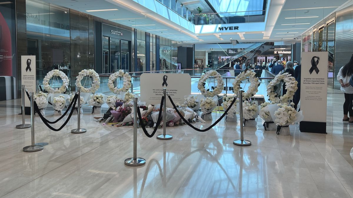 Sydneysiders are encouraged to leave flowers and sign a condolences book on level four. (Yashee Sharma)