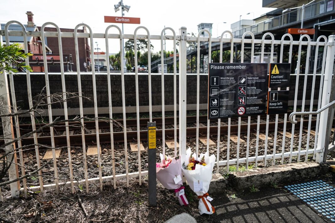 Flowers left at Carlton Station after the horrific accident in which a father and two year old were killed. (Nick Moir)