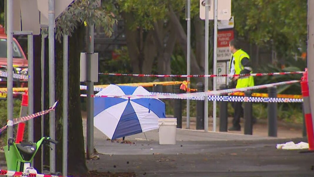 The staff member was using an umbrella to protect the chemical before it reacted. (Nine)