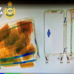 2.The two men were charged with attempting to smuggle cocaine and methamphetamine into Sydney Airport. (AFP)