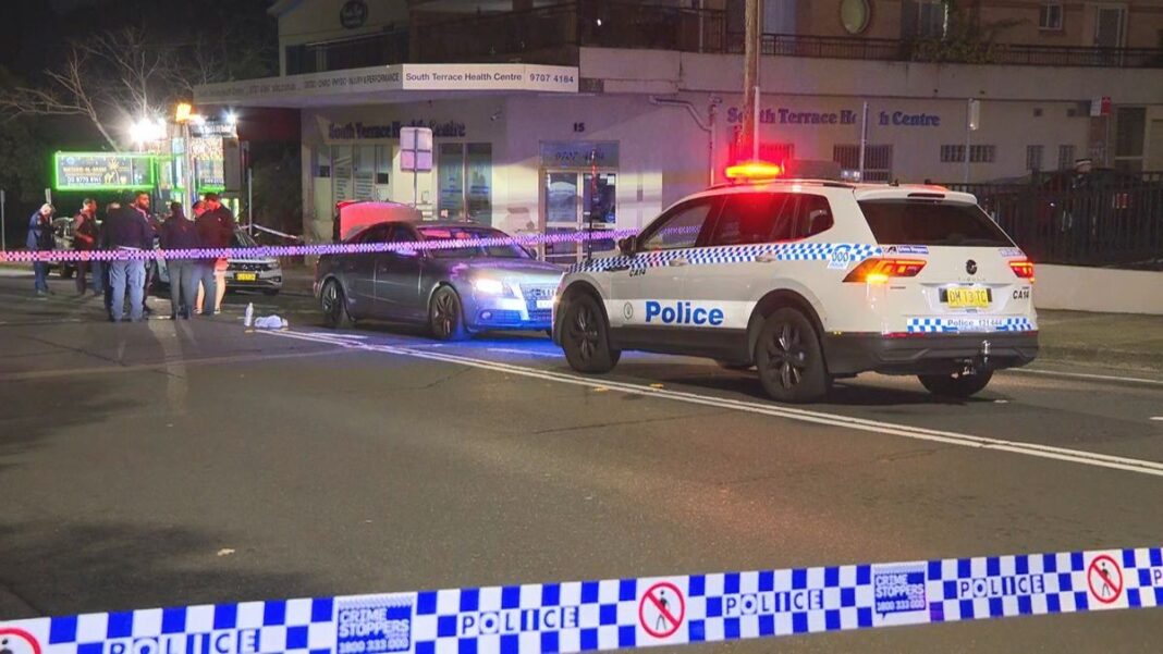 Emergency services were called ﻿to a road in Punchbowl after witnesses found a man lying on the road unconscious. (Nine)