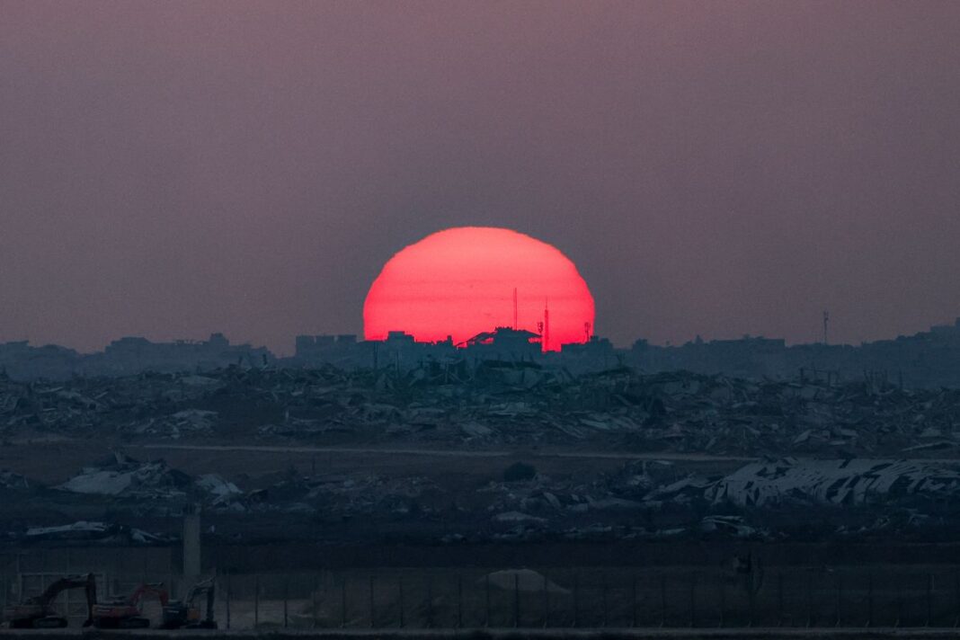 The sun sets over the Gaza Strip on August 10, 2025. (AFP)