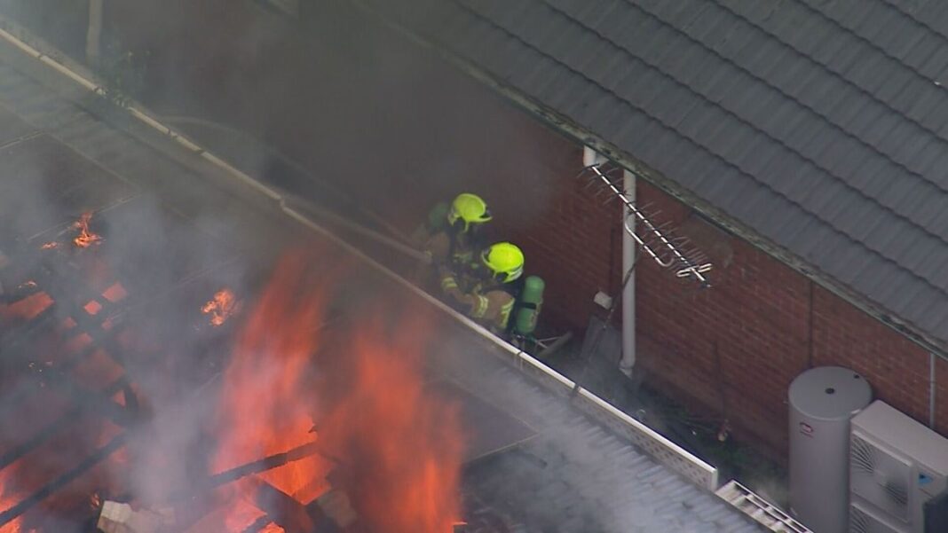 Six firetrucks and 22 firefighters are on the scene attempting to extinguish the blaze. (9News)