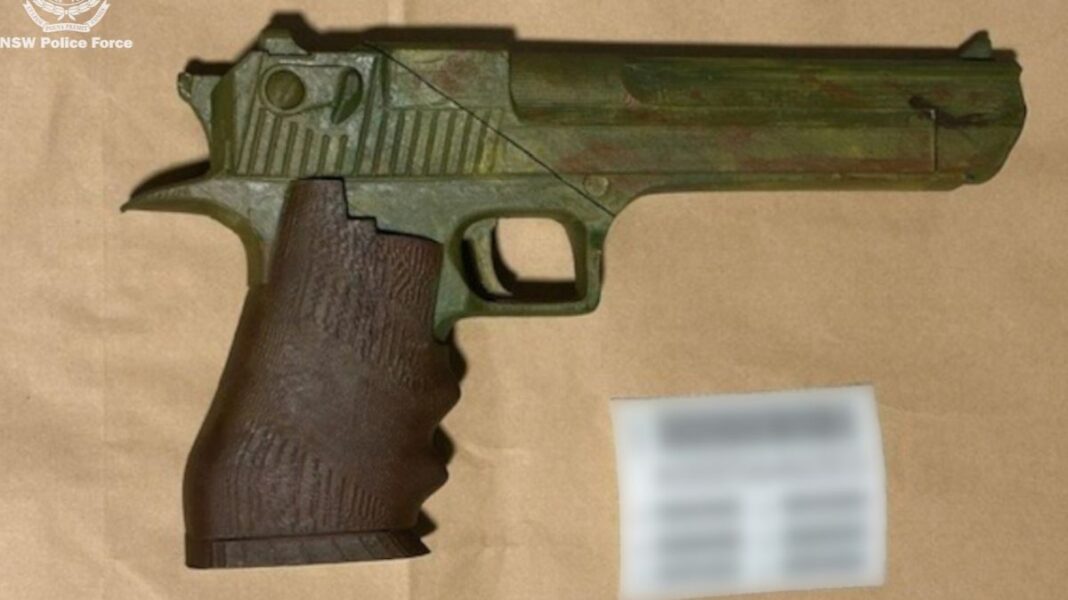 Police allegedly found and seized two guns and electronic devices. (NSW Police)
