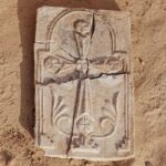4.A stucco cross was discovered at a 1,400-year-old monastery in the United Arab Emirates. (Image credit_Department of Culture and Tourism — Abu Dhabi).PNG