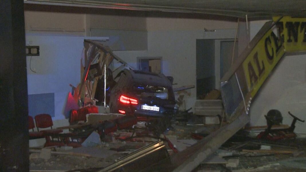 The collision sent the BMW into the front of a medical centre. (9News)