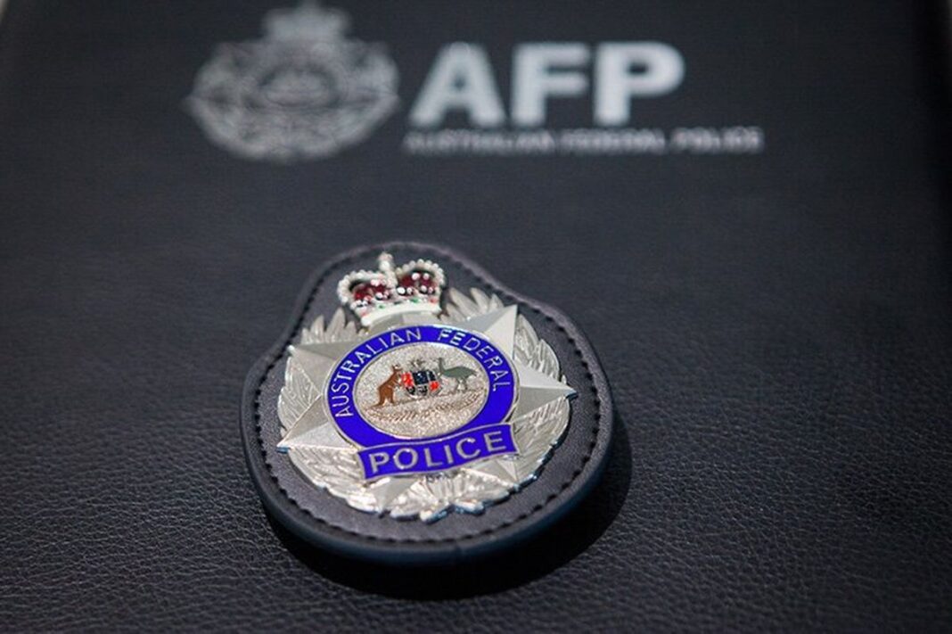 The woman was arrested and charged after the AFP and ASIO launched Operation Autumn-Shield. (AFP)_9news