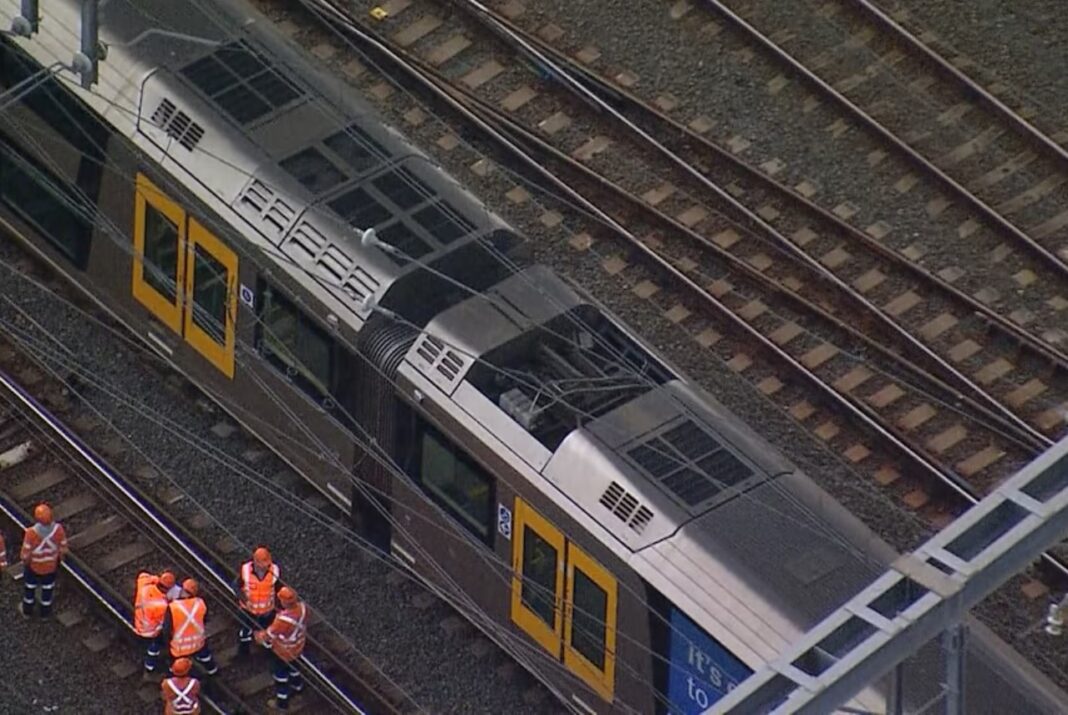 The overhead cable fell onto a train near Homebush. (ABC News)