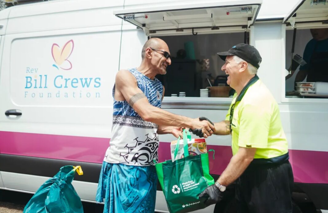 The Rev Bill Crews Foundation food van manager and driver Tony Farrell, serving up lunch and grocery drops to those in need at the Lethbridge Park Community Centre, December 7.CreditDion Georgopoulos