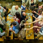 6Communal dining, a divisive trend that experienced surges of popularity in the 1980s and early 2000s, is making a comeback. Peter SchatzGetty Images_BUSINESSINSIDER