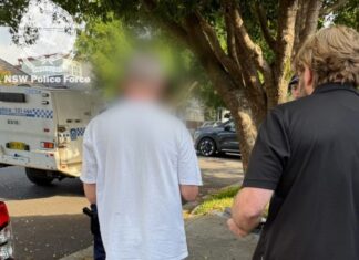 시드니 사립학교 교사, 미성년자 성범죄 공모 혐의로 기소 An image released by NSW Police showing the arrest of Sydney private school teacher Peter James Adams. (NSW Police)_9news