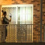 5.Emergency services were called to the property Macquarie Street in Greenacre at 1am today after reports a glass fire bomb had been thrown, which ignited a fire. (Nine)