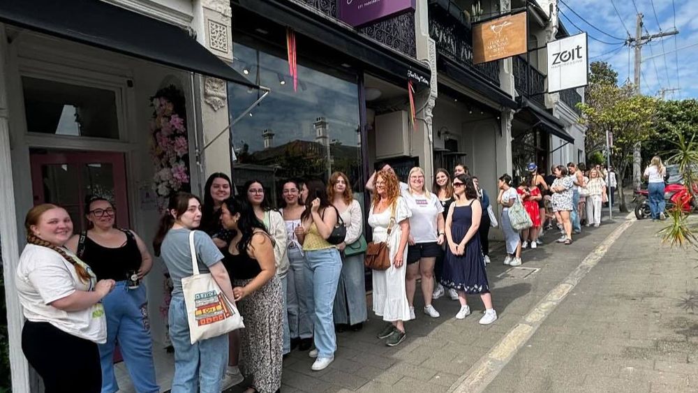 Shoppers line up down the block to visit Australia's niche romance book stores. (Instagram@romancing.the.novel)