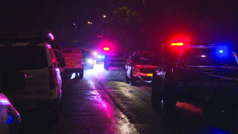 Emergency services were called to a home in Campbelltown about 7.50pm overnight. (9News)