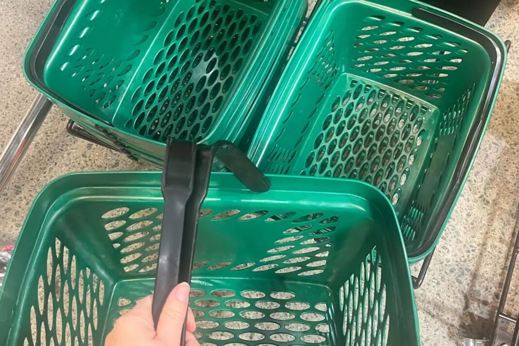 Woolies has replaced its controversial single-handle shopping baskets with dual-handle ones. Amy Lyall_9news