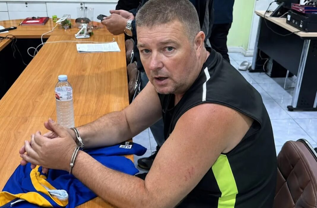 Thai immigration detained Simon Peter Carman, 45, at Bangkok's Suvarnabhumi Airport around 9.30pm local time (12.30am Saturday AEST), where he was allegedly trying to leave on a flight to Perth, local media reported._9NEWS
