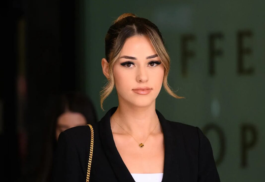 2.Sarah Mouhanna allegedly wore a banned Hezbollah flag at a protest, after a police warning. Dan Himbrechts_9news Sarah Mouhanna allegedly wore a banned Hezbollah flag at a protest, after a police warning. Dan Himbrechts_9news